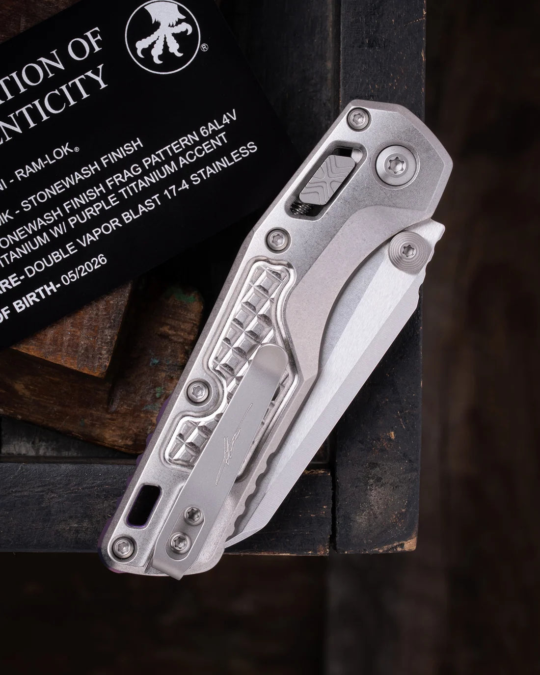 Microtech MSI® MINI- RAM-LOK MARFIONE SELECT STONEWASH FINISH STONEWASH FINISH FRAG PATTERN TITANIUM W/ PURPLE TITANIUM ACCENT DOUBLE VAPOR BLAST STAINLESS (210M-10FRMS4)
